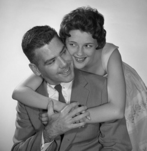 Portrait of couple embracing Poster Print - Item # VARSAL255418089