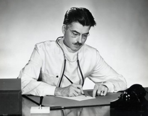 Close-up of a male doctor writing on a sheet of paper Poster Print - Item # VARSAL25534626