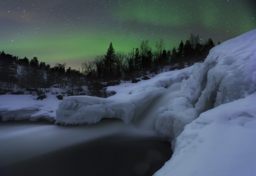 A wintery waterfall and aurora borealis over Tennevik River, Troms, Norway Poster Print - Item # VARPSTAHE100115S