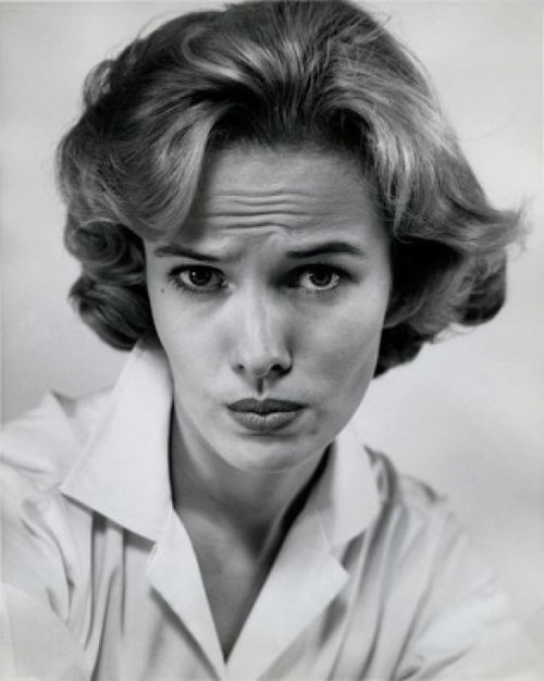 Portrait of a young woman frowning Poster Print - Item # VARSAL25510359