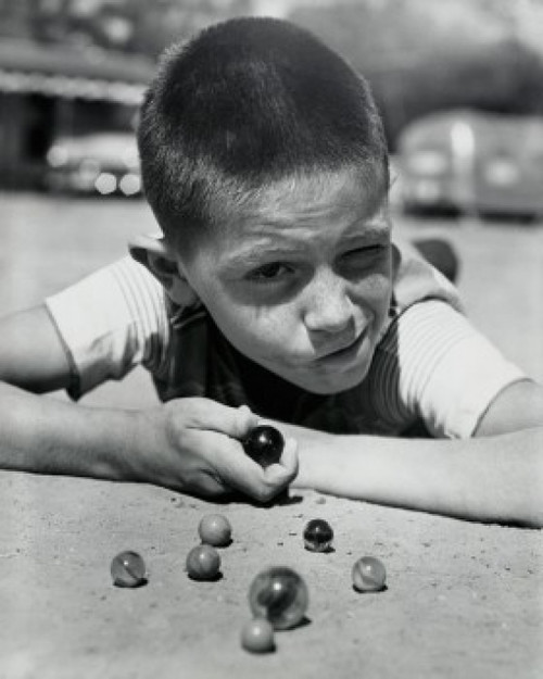 Close-up of a boy playing marbles Poster Print - Item # VARSAL2553207