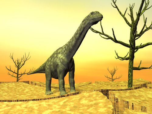 Argentinosaurus dinosaur standing on the cracked desert ground next to dead trees Poster Print - Item # VARPSTEDV600053P