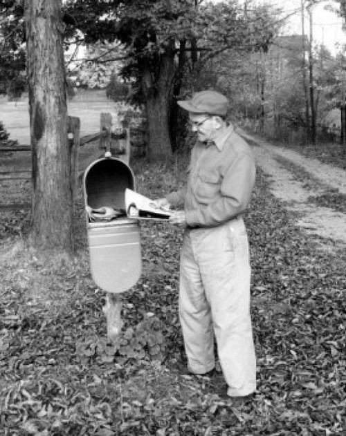 Man checking mailbox Poster Print - Item # VARSAL25549050