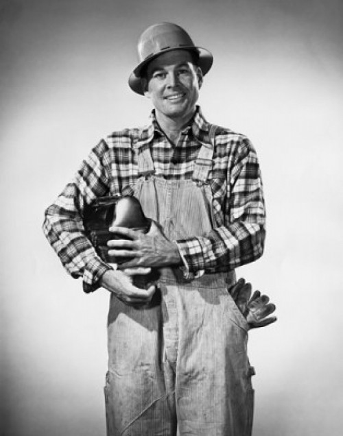 Construction worker holding a lunch box and smiling Poster Print - Item # VARSAL2553574B