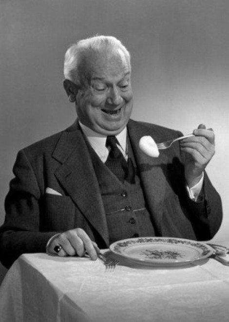 Senior man eating Poster Print
