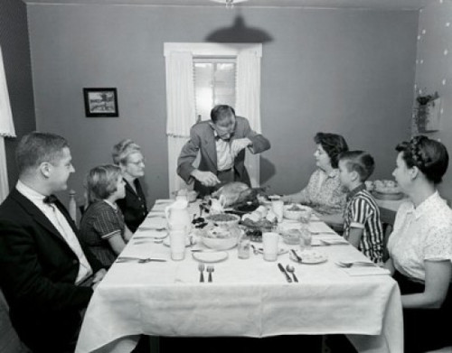 Family at a dining table on Thanksgiving Day Poster Print - Item # VARSAL25528771