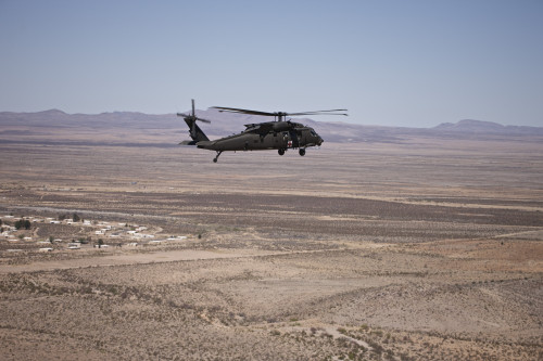UH-60 Black Hawk en route to Playas Training Area, New Mexico during exercise Angel Thunder 2013 Poster Print - Item # VARPSTTMO100997M