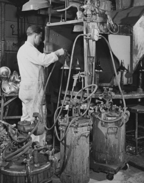 Side profile of a worker working in a factory Poster Print - Item # VARSAL25536698
