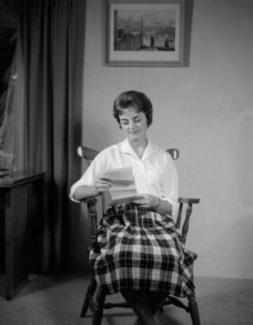Mid adult woman reading letter Poster Print - Item # VARSAL255423009