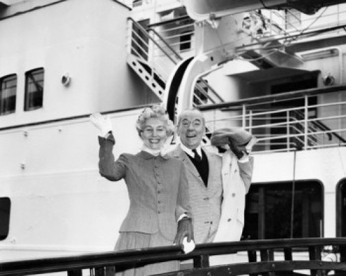 Portrait of senior couple waving from cruise ship Poster Print - Item # VARSAL25523993