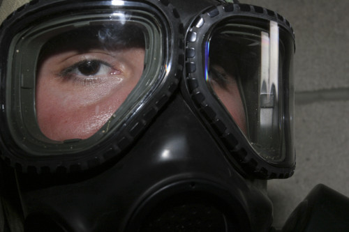 November 22, 2005 - A Marine glares through the limited-spaced eye protection part of his gas mask. Poster Print - Item # VARPSTSTK102050M
