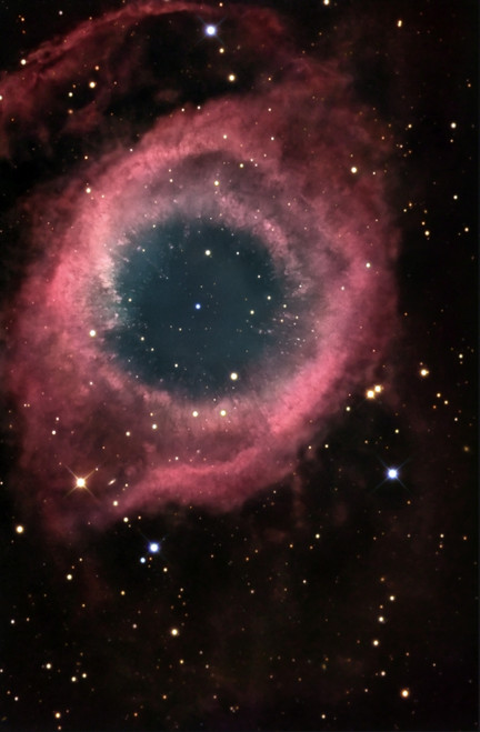 The Helix Nebula, also known as NGC 7293, is a planetary nebula in the constellation Aquarius. It is one of the closest planetary nebulae to Earth and has a very similar appearance to the Ring Nebula Poster Print - Item # VARPSTGAB100033S