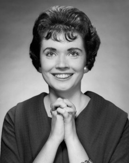 Portrait of a mid adult woman smiling Poster Print - Item # VARSAL25511311