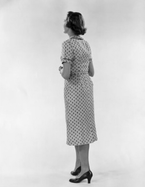 Studio shot of young woman wearing spotted dress Poster Print - Item # VARSAL25542047
