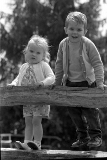 Boy and girl standing on rail fence Poster Print - Item # VARSAL2559984