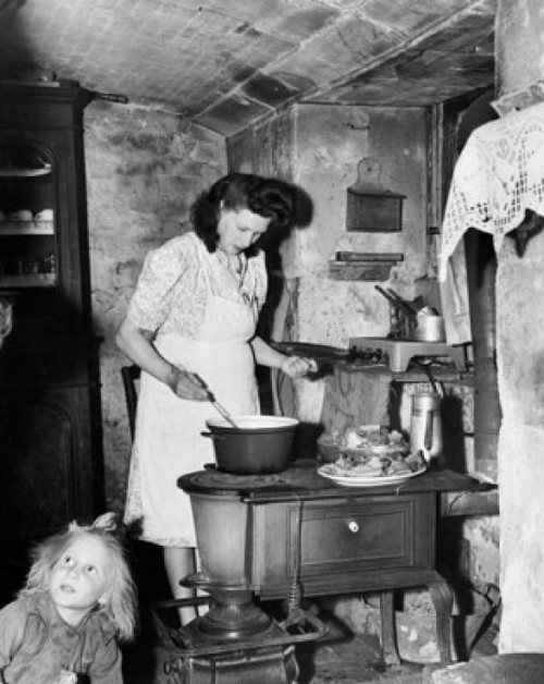 Mid adult woman cooking Poster Print - Item # VARSAL9902980