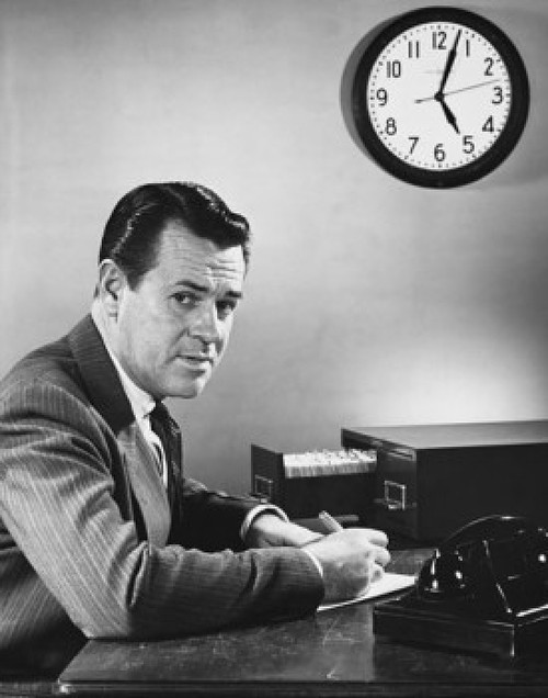 Businessman writing on an index card with a pen in an office Poster Print - Item # VARSAL25548293