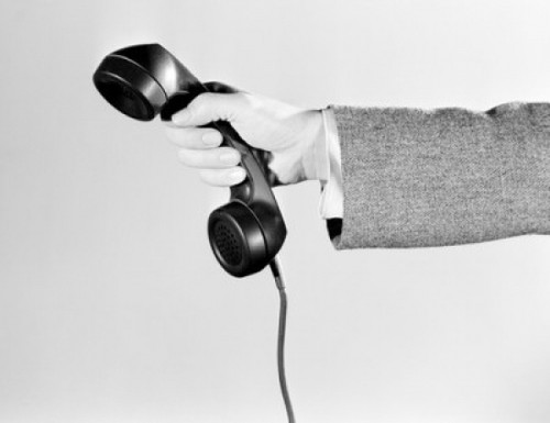 Hand holding telephone receiver Poster Print - Item # VARSAL255419191