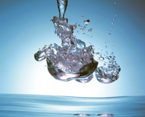Iridescent water bubble formation floating above the surface of deep blue water Poster Print by Panoramic Images (24 x 20) - Item # PPI118021