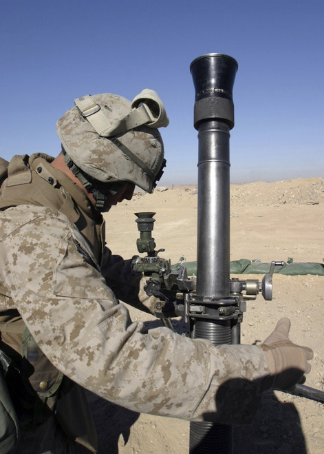 Al Anbar, Iraq, January 1, 2006 - An 81mm mortarman adjusts the mortar sights during a fire mission aboard Forward Operating Base Hit, Iraq. Poster Print - Item # VARPSTSTK102153M
