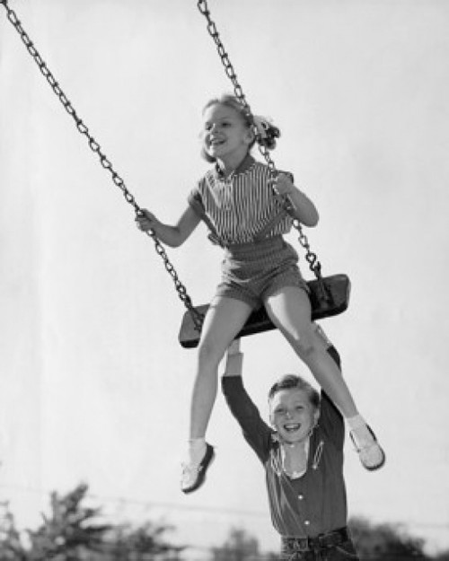 Boy pushing his sister on a swing Poster Print - Item # VARSAL2553975