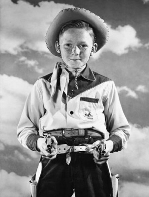 Boy in cowboy costume holding toy guns Poster Print - Item # VARSAL25512963A Boy in cowboy costume holding toy guns Poster Print - Item # VARSAL25512963A