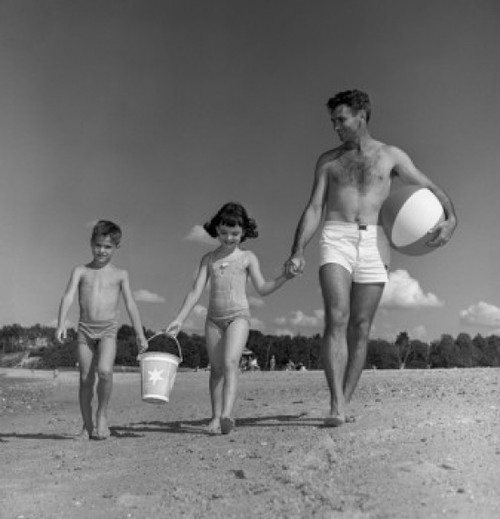 Father  daughter and son walking along beach Poster Print - Item # VARSAL255418017