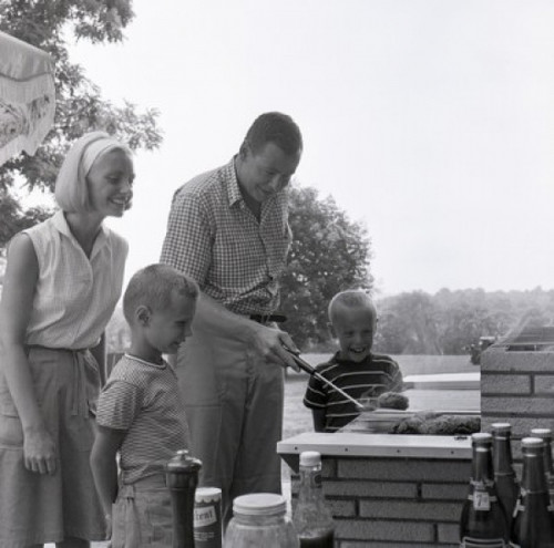 Family with two sons having barbecue Poster Print - Item # VARSAL255421009