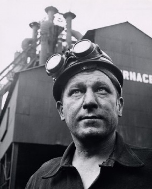 Close-up of a steel worker outside a steel mill Poster Print
