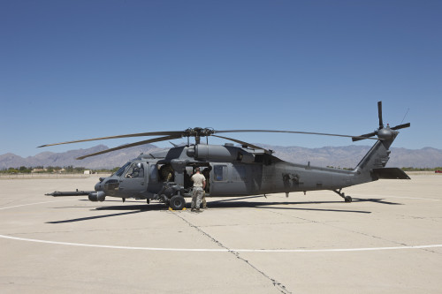 HH-60G Pave Hawk with pararescuemen at Davis-Monthan Air Force Base, Arizona, during exercise Angel Thunder 2013 Poster Print - Item # VARPSTTMO101104M