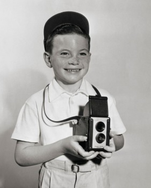 Boy holding camera Poster Print - Item # VARSAL2558788
