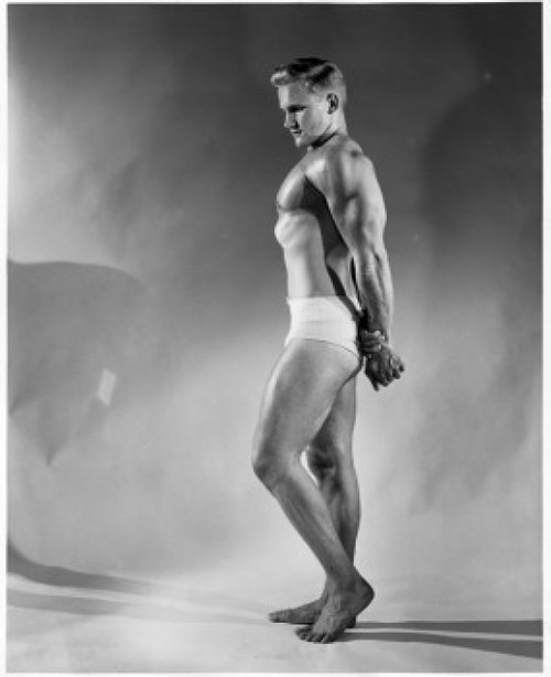 Side profile of a young man flexing his muscles Poster Print - Item # VARSAL2557435