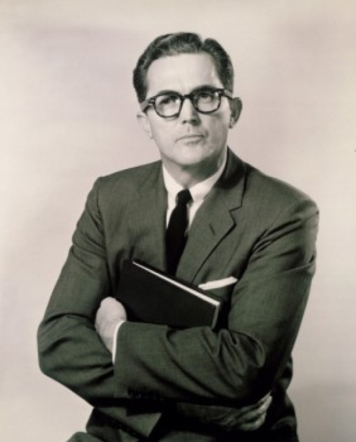 Portrait of a businessman holding a book Poster Print - Item # VARSAL25518988