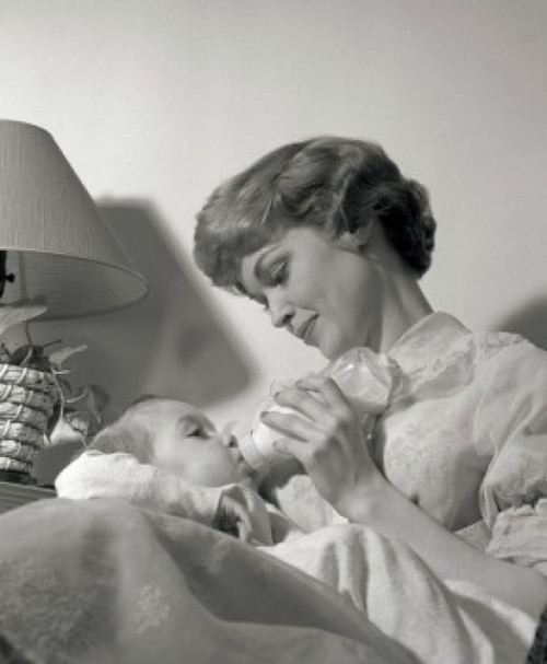 Mother feeding baby with bottle Poster Print - Item # VARSAL2559845