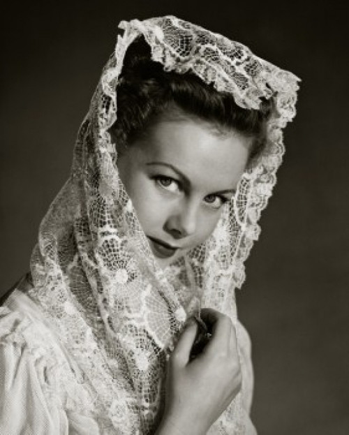 Portrait of young woman holding headscarf Poster Print - Item # VARSAL2552812