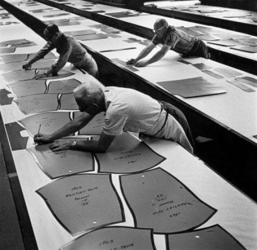 High angle view of three workers in a textile factory  1963 Poster Print