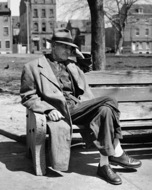 Senior man sitting on a park bench and thinking Poster Print - Item # VARSAL25524862B