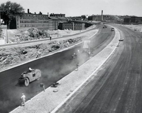 High angle view of workers constructing a road Poster Print