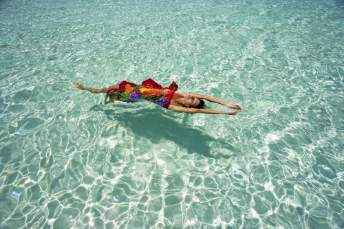 Woman Floating In Tropical Ocean Water. PosterPrint - Item # VARDPI1967401 Woman Floating In Tropical Ocean Water. PosterPrint - Item # VARDPI1967401