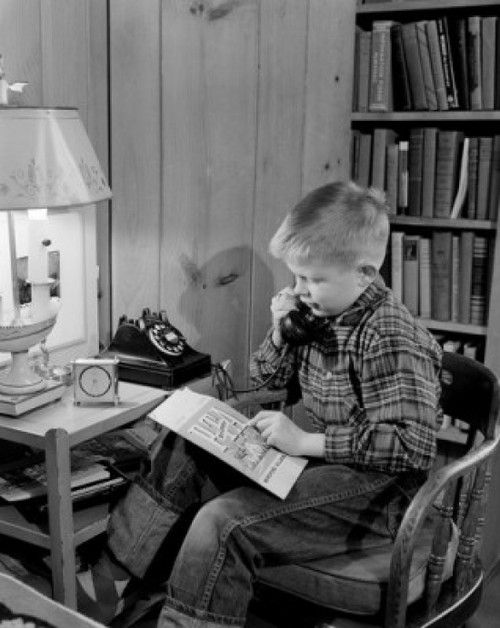 Boy calling on phone Poster Print - Item # VARSAL255416447