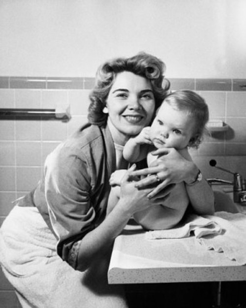 Young woman hugging her baby and smiling Poster Print - Item # VARSAL2559885