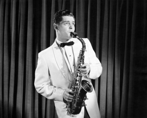 Mid adult man playing a saxophone on stage Poster Print - Item # VARSAL2556472