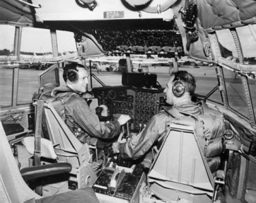 Rear view of two US Air Force pilots sitting in the cockpit of an aircraft Poster Print - Item # VARSAL25543995
