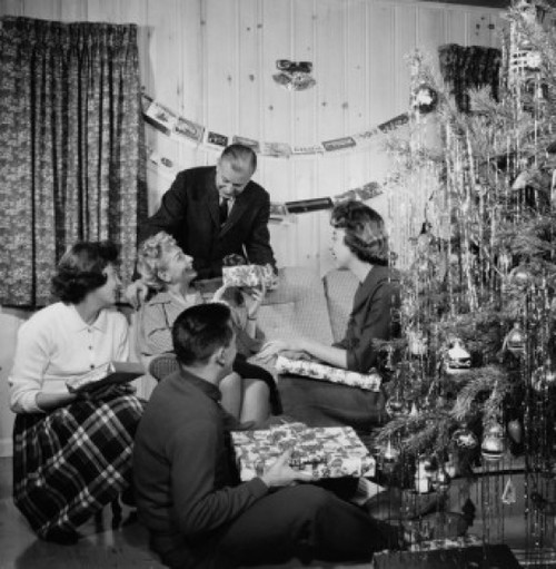 Senior couple celebrating Christmas with children Poster Print - Item # VARSAL25528608