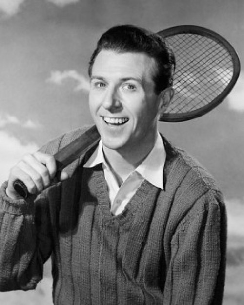 Portrait of a young man holding a tennis racket and smiling Poster Print - Item # VARSAL2553655A