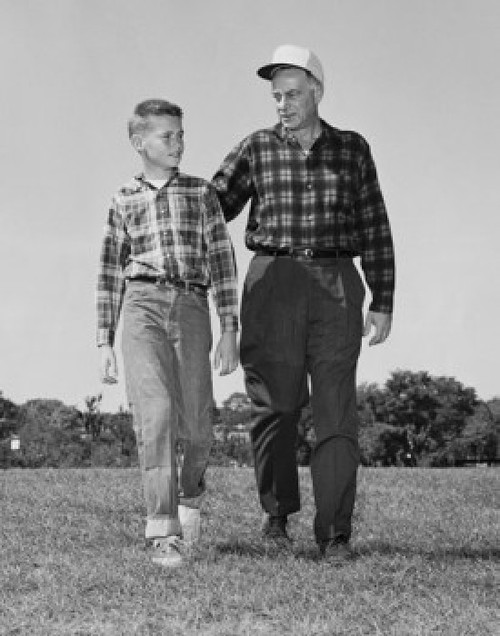 Grandfather and his grandson walking in a park Poster Print - Item # VARSAL25520091B Grandfather and his grandson walking in a park Poster Print - Item # VARSAL25520091B