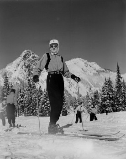 Ski Patrol woman with snowcapped mountains in background Poster Print - Item # VARSAL255424658