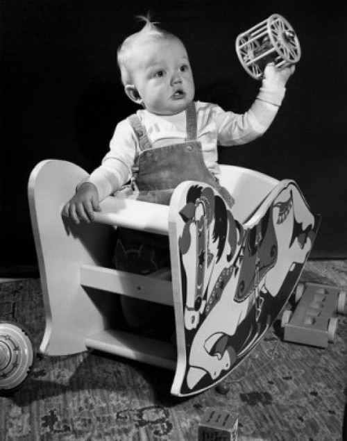 baby sitting in rocking horse Poster Print - Item # VARSAL2559560A