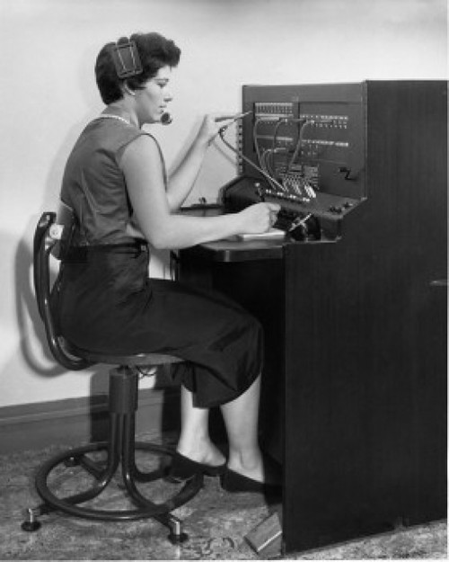 Side profile of a female telephone operator operating a telephone switchboard Poster Print - Item # VARSAL2552213 Side profile of a female telephone operator operating a telephone switchboard Poster Print - Item # VARSAL2552213