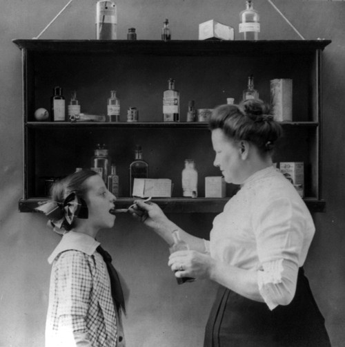 Spoonful of Medicine, 1915 Poster Print by Science Source